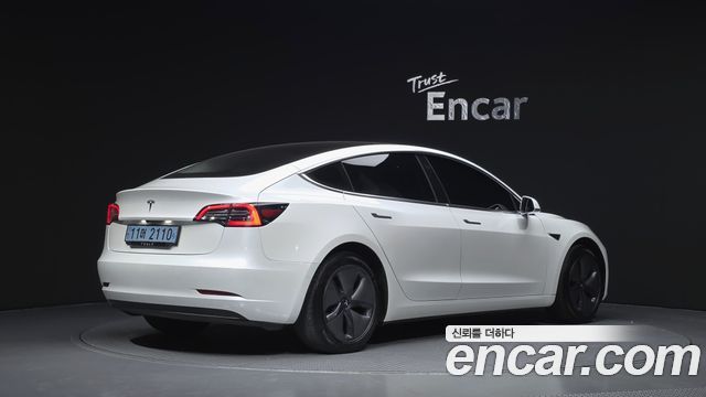 Tesla Model 3 Standard Range Plue RWD - фото 1