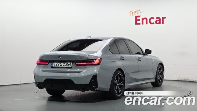 BMW 3-Series G20 320i M Sport - фото 1