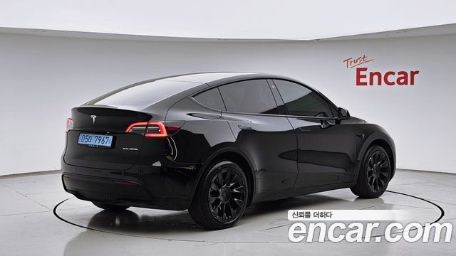 Tesla Model Y Long Range AWD - фото 1