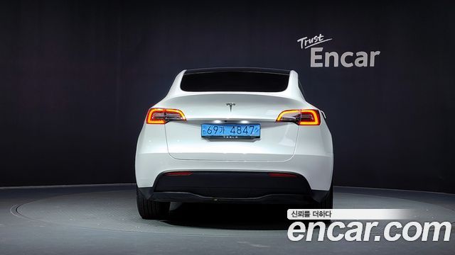 Tesla Model Y Long Range AWD - фото 3