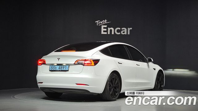 Tesla Model 3 Standard Range Plue RWD - фото 1