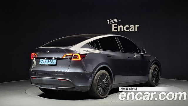 Tesla Model Y Long Range AWD - фото 1