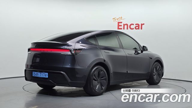 Tesla Model Y Long Range AWD - фото 1