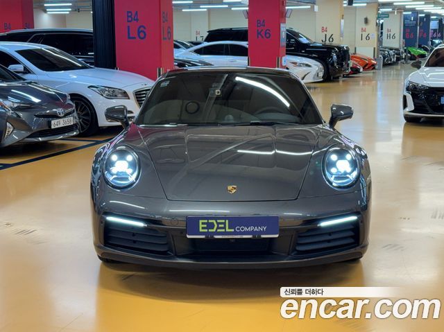 Porsche 911 Carrera 4 - фото 1