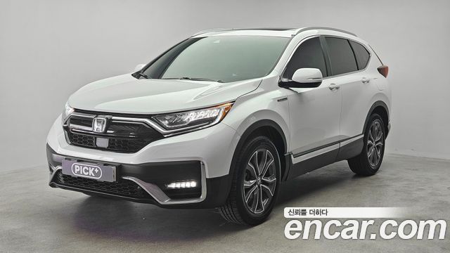 Honda CR-V 5-го поколения 2.0 Hybrid Touring 4WD - фото 0