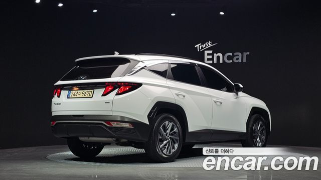 Hyundai Tucson NX4, гибрид Premium 4WD - фото 1