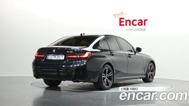 BMW 3-Series G20 320i M Sport - фото 1