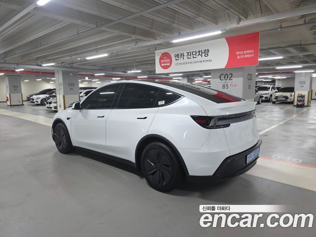 Tesla Model Y Long Range AWD - фото 1