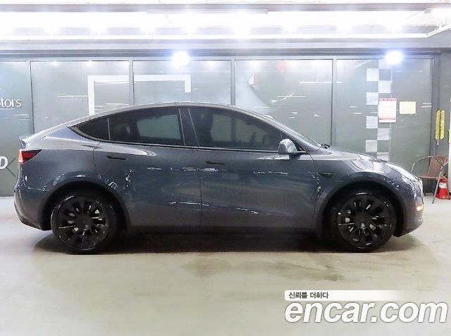 Tesla Model Y Long Range AWD - фото 2