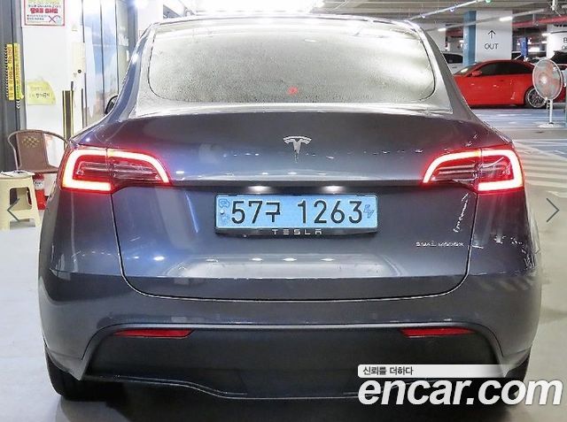 Tesla Model Y Long Range AWD - фото 4