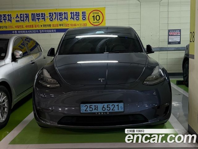Tesla Model Y Long Range AWD - фото 1