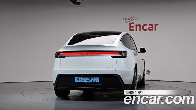 Tesla Model Y Long Range AWD - фото 2