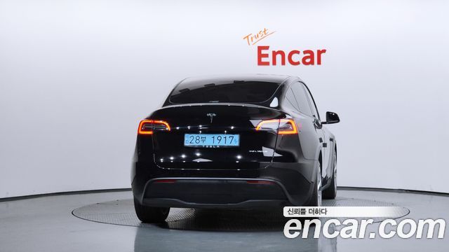 Tesla Model Y Long Range AWD - фото 3