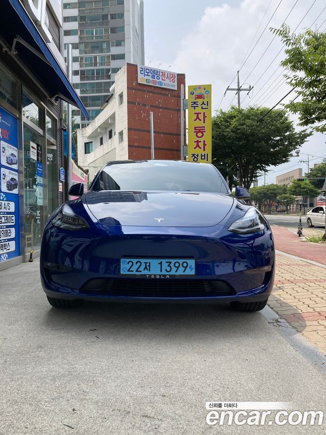 Tesla Model Y Standard Range RWD - фото 2