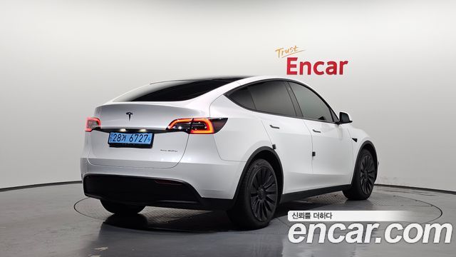 Tesla Model Y Long Range AWD - фото 1