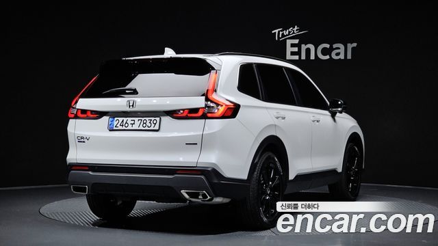 Honda CR-V 6-го поколения 2.0 Hybrid Touring 4WD - фото 1