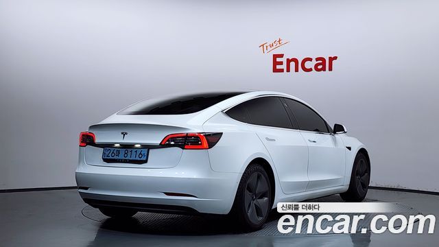 Tesla Model 3 Standard Range Plue RWD - фото 1