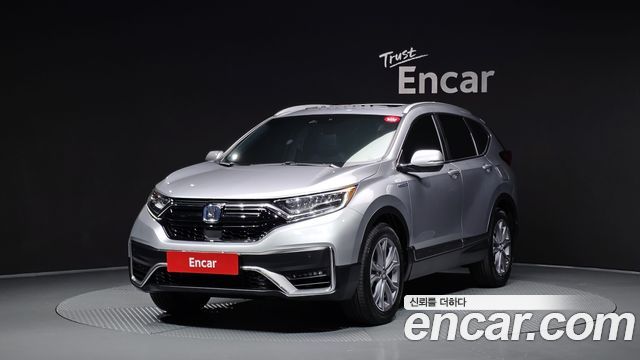Honda CR-V 5-го поколения 2.0 Hybrid Touring 4WD - фото 0