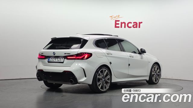 BMW 1-Series F40 M135i xDrive - фото 1
