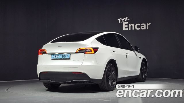 Tesla Model Y Long Range AWD - фото 1