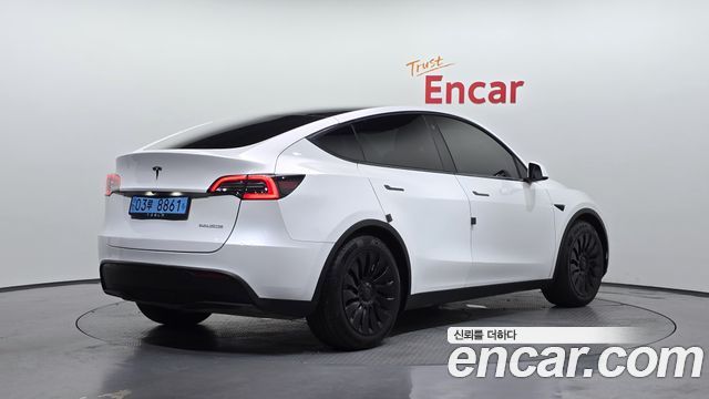 Tesla Model Y Long Range AWD - фото 1