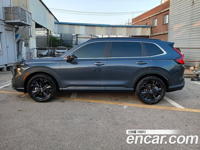 Honda CR-V 6-го поколения 2.0 Hybrid Touring 2WD - фото 1