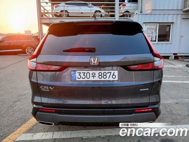 Honda CR-V 6-го поколения 2.0 Hybrid Touring 2WD - фото 3
