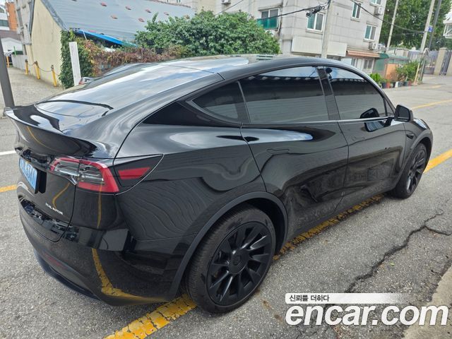 Tesla Model Y Long Range AWD - фото 4