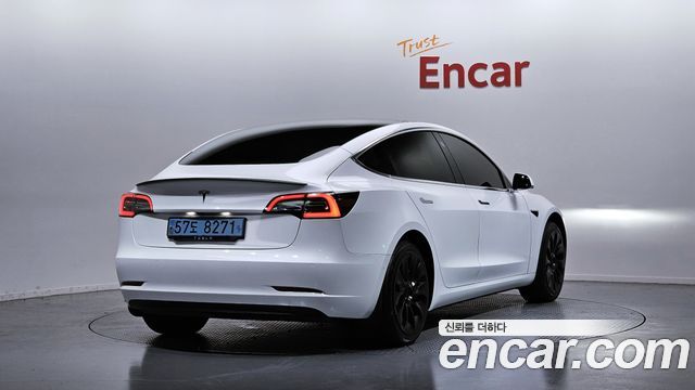 Tesla Model 3 Standard Range Plue RWD - фото 1