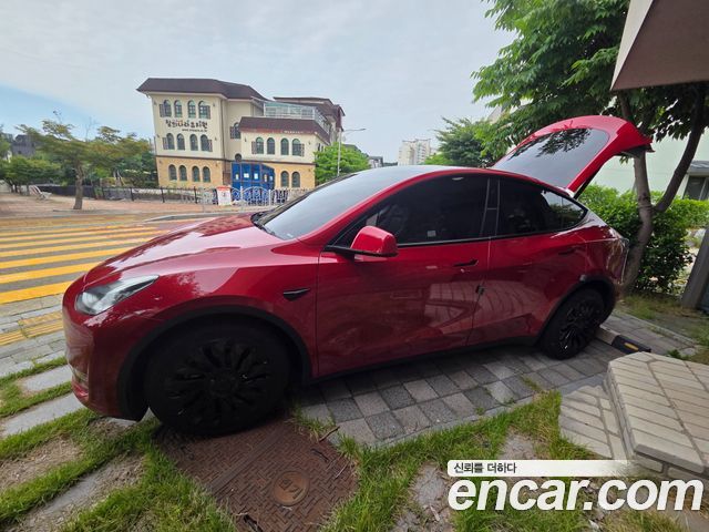 Tesla Model Y Long Range AWD - фото 0