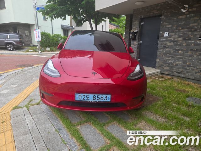 Tesla Model Y Long Range AWD - фото 1