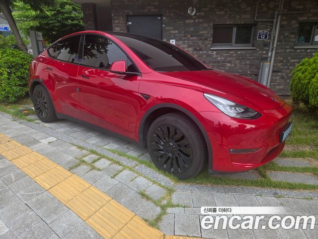 Tesla Model Y Long Range AWD - фото 2