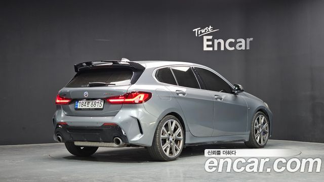 BMW 1-Series F40 M135i xDrive - фото 1