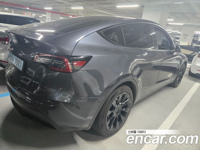 Tesla Model Y Long Range AWD - фото 1