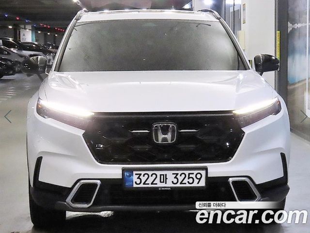 Honda CR-V 6-го поколения 2.0 Hybrid Touring 2WD - фото 1