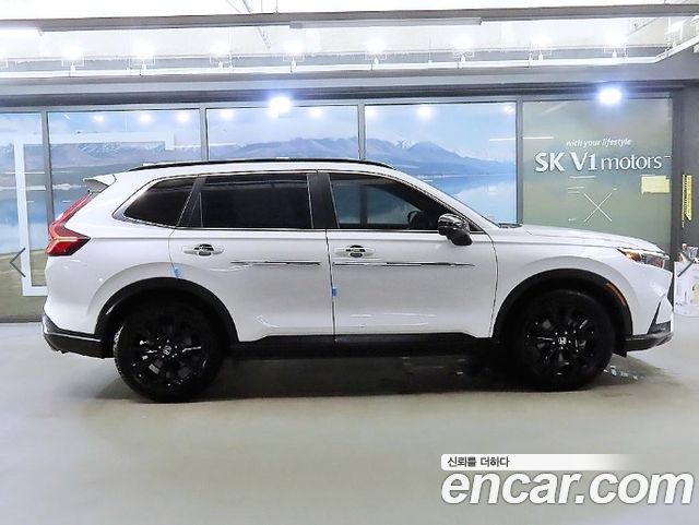 Honda CR-V 6-го поколения 2.0 Hybrid Touring 2WD - фото 2