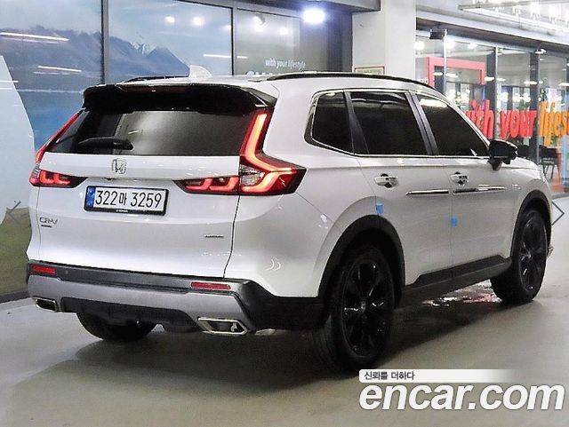 Honda CR-V 6-го поколения 2.0 Hybrid Touring 2WD - фото 3