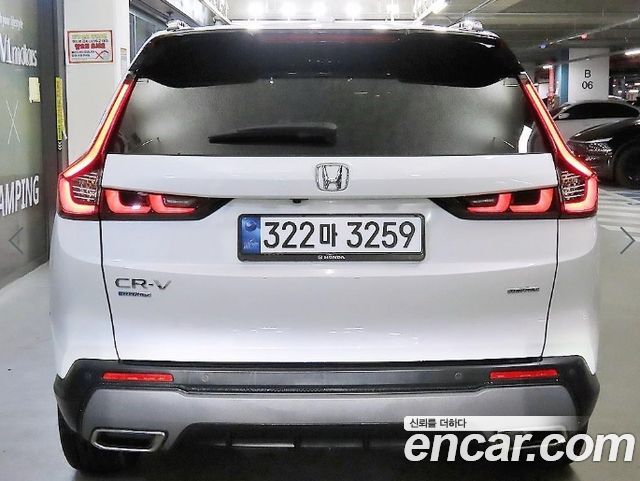 Honda CR-V 6-го поколения 2.0 Hybrid Touring 2WD - фото 4