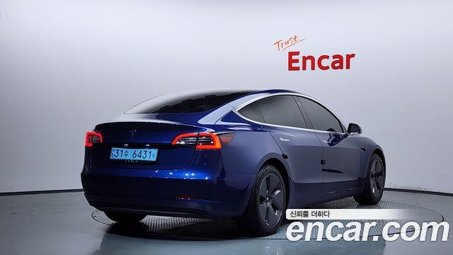 Tesla Model 3 Standard Range Plue RWD - фото 1