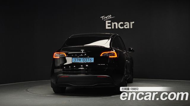 Tesla Model Y Long Range AWD - фото 3