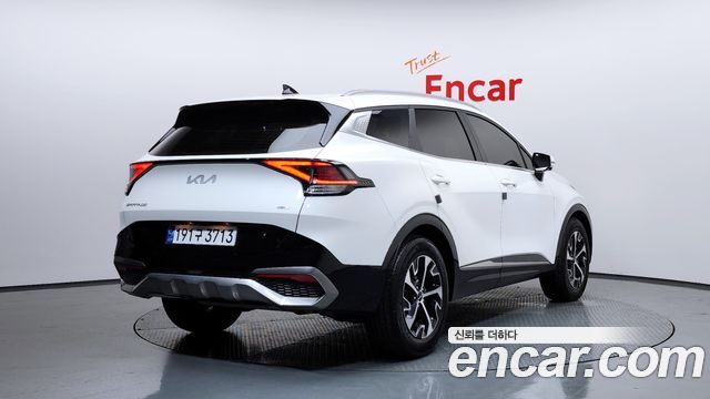 Kia Sportage 5-го поколения, гибрид Signature 2WD - фото 1