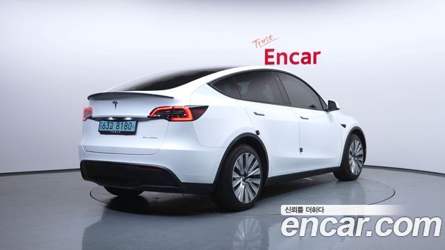 Tesla Model Y Long Range AWD - фото 1
