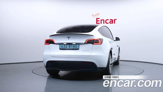 Tesla Model Y Long Range AWD - фото 3