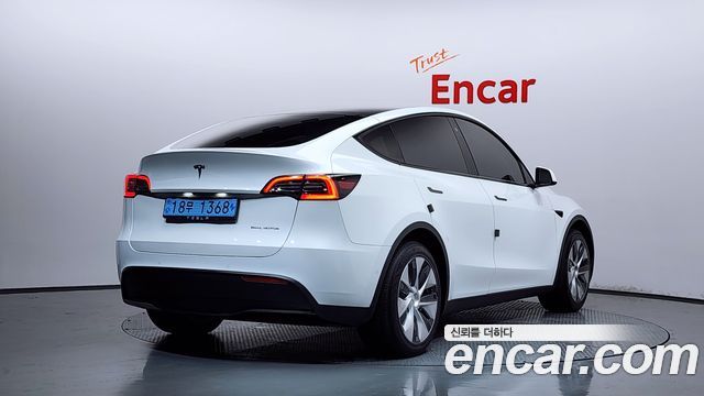 Tesla Model Y Long Range AWD - фото 1