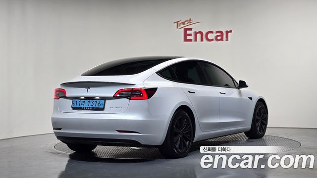 Tesla Model 3 Long Range AWD - фото 1