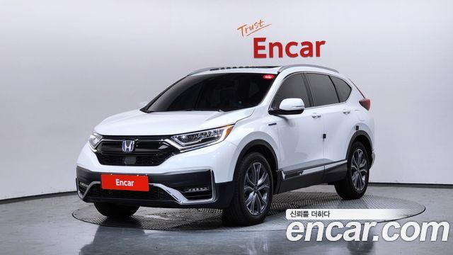 Honda CR-V 5-го поколения 2.0 Hybrid Touring 4WD - фото 0