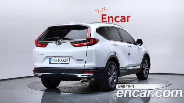 Honda CR-V 5-го поколения 2.0 Hybrid Touring 4WD - фото 1