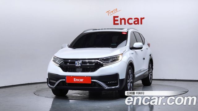 Honda CR-V 5-го поколения 2.0 Hybrid Touring 4WD - фото 2