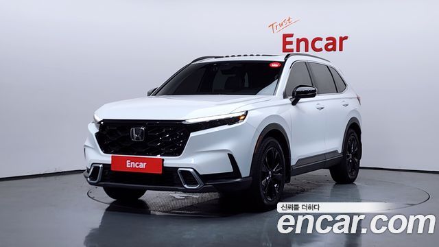 Honda CR-V 6-го поколения 2.0 Hybrid Touring 4WD - фото 0