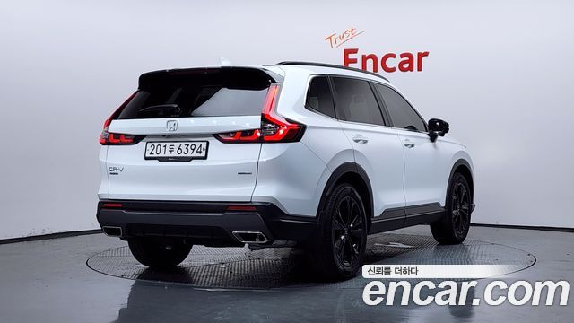 Honda CR-V 6-го поколения 2.0 Hybrid Touring 4WD - фото 1